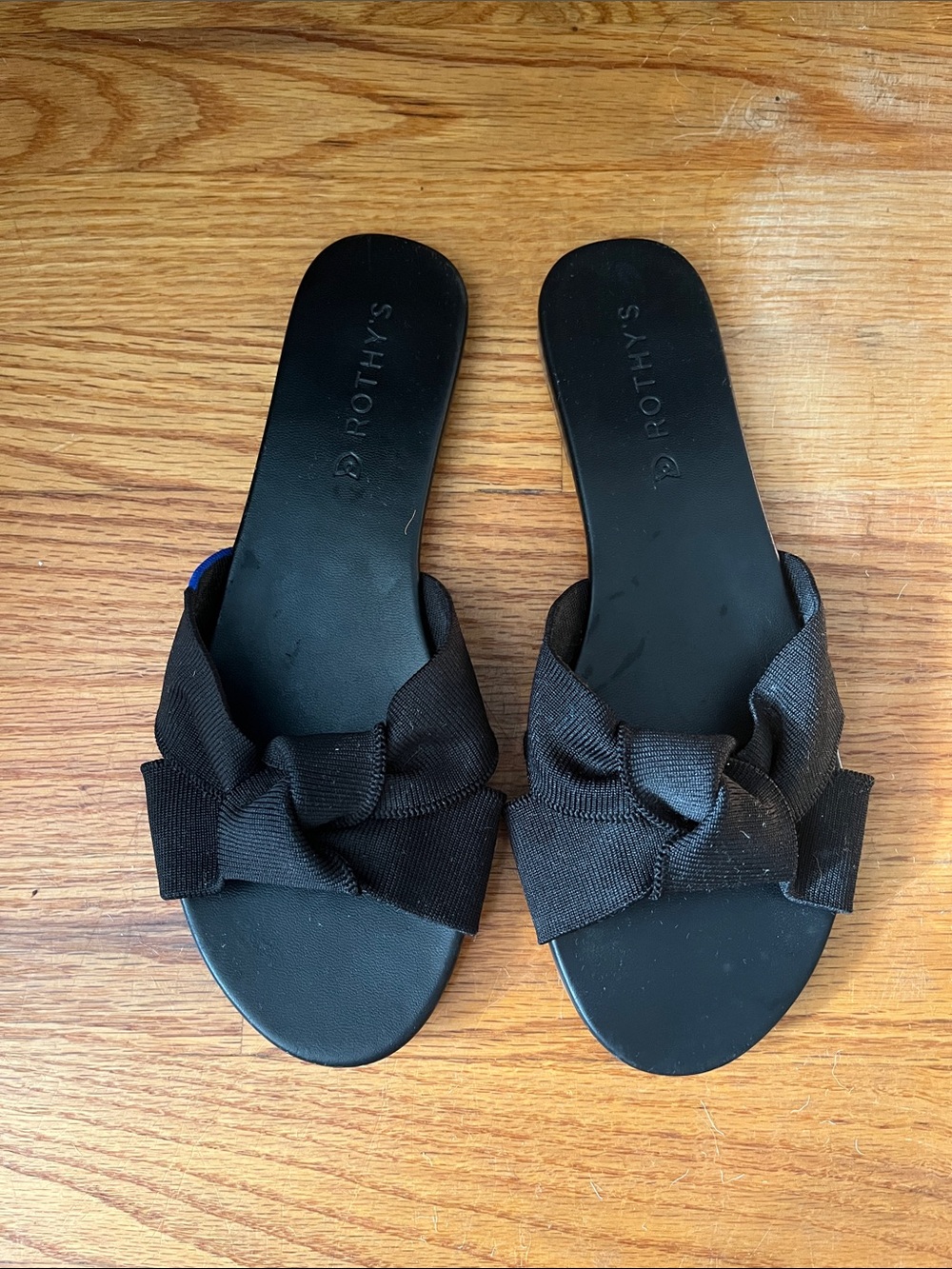 Black Rothy’s slides size 7.5M